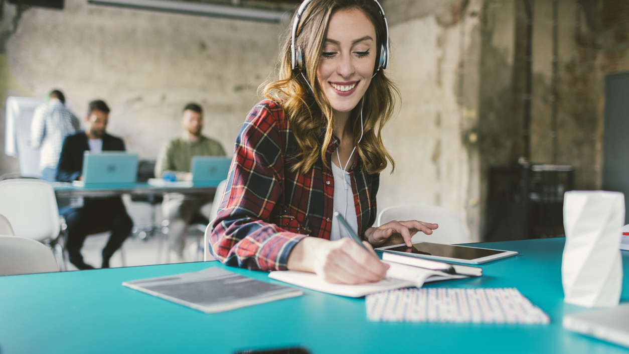 Podcast Export Echo transcripts Woman with headphones at a desk
